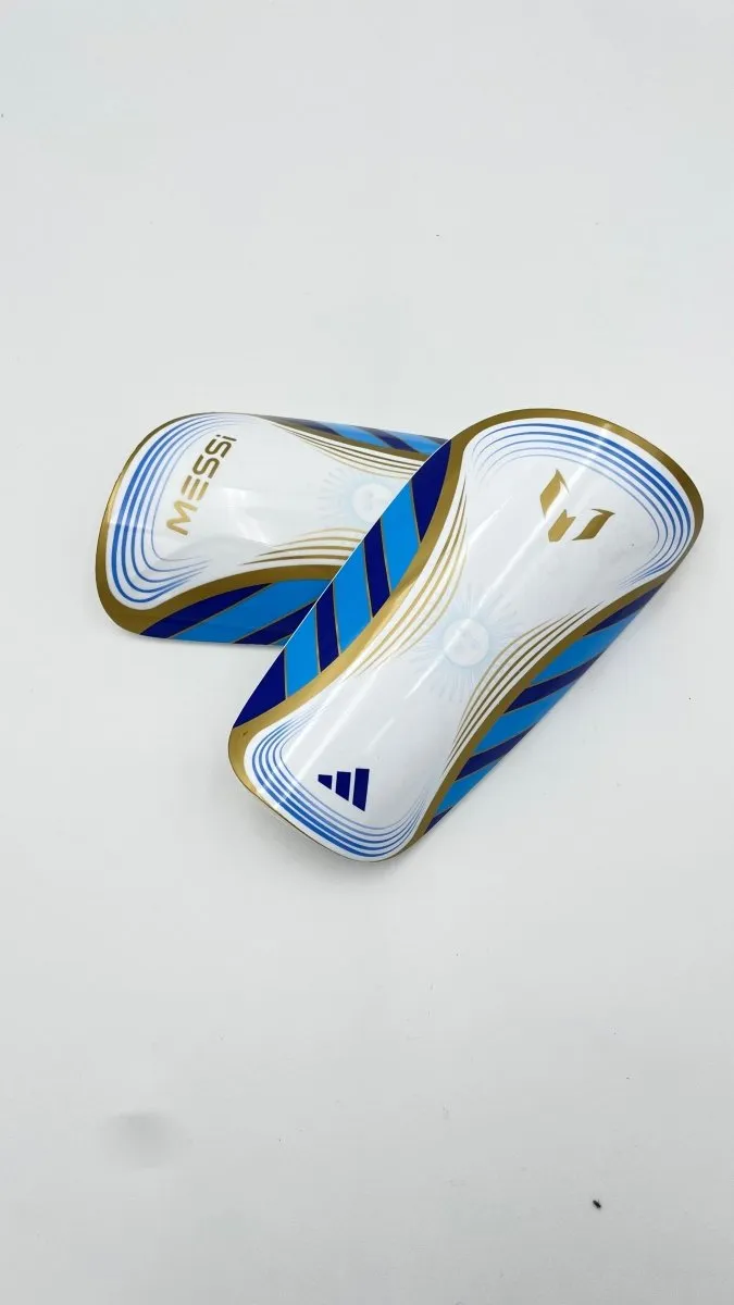 Adidas Messi soccer shin guards, white and blue - Shop now!